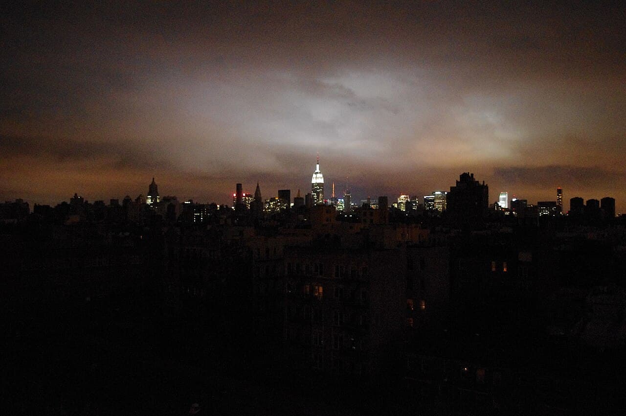 Manhattan skyline during Hurricane Sandy blackout showing half the island in darkness